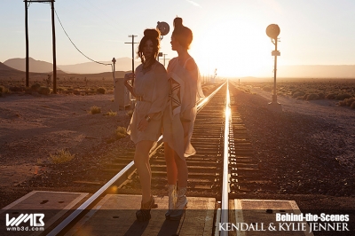 Ultimate Graveyard Mojave Desert Shoot Location - BTS with Kendall Jenner & Kylie Jenner Fashion Photoshoot by Nick Saglimbeni for WMB 3D Magazine on railroad train tracks sunset