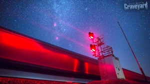 Ultimate Graveyard night desert astral photography with time-lapse and long exposure of moving train at the Mojave desert film rental location